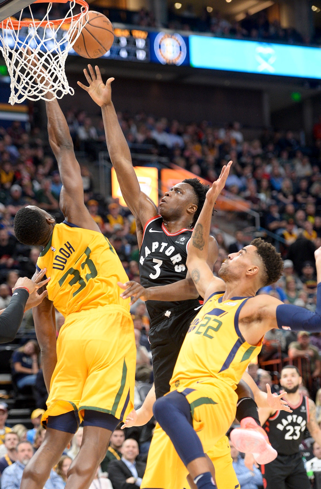 Leah Hogsten  |  The Salt Lake Tribune  Toronto Raptors forward OG Anunoby (3) hits the net between Utah Jazz center Ekpe Udoh (33) and Utah Jazz forward Thabo Sefolosha (22) as the Utah Jazz lose to the Toronto Raptors, 111-124, Monday, Nov. 5, 2018 at  Vivint Smart Home Arena.