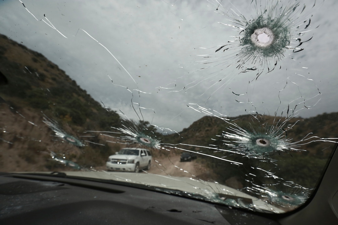 (Christian Chavez | AP) Bullet-riddled vehicles that members of the extended LeBaron family were traveling in sit parked on a dirt road near Bavispe, at the Sonora-Chihuahua state border, Mexico, Wednesday, Nov. 6, 2019. Three women and six of their children, related to the extended LeBaron family, were gunned down in an attack while traveling here Monday.