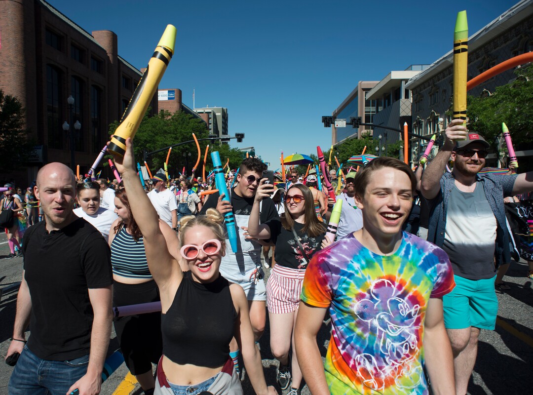 (Rick Egan  |  The Salt Lake Tribune)   Utah Educators for Pride hold giant crayons as they march, in the Utah Pride Parade, in Salt Lake City, Sunday, June 3, 2018.