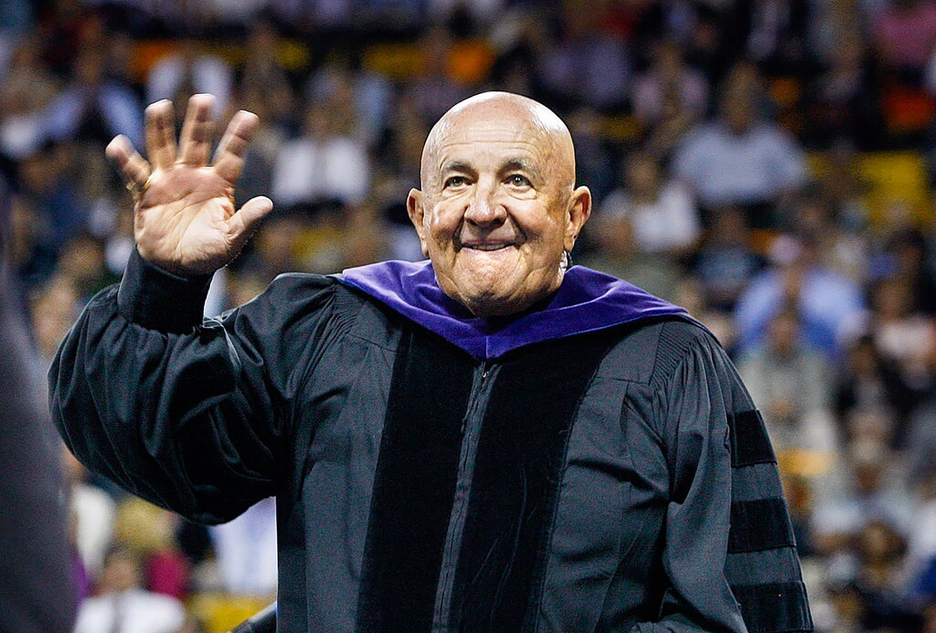 (Scott Sommerdorf | The Salt Lake Tribune) Former Sen. Mike Dmitrich waves after he was awarded an honorary doctorate at Utah State's graduation in Logan, Saturday, May 7, 2011. Dmitrich died this week at 87.