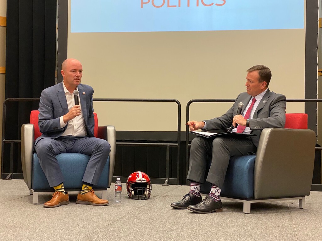 (Mark Eddington | The Salt Lake Tribune) Utah Tech University President Richard Williams, right, speaks to Gov. Spencer Cox on Thursday, Oct. 6, 2022 in St. George.