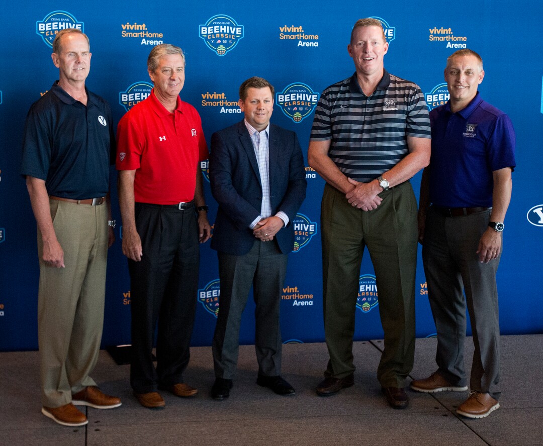 (Rick Egan  |  Tribune File Photo)  Left to Right - Tom Holmoe, Athletic Director, Brigham Young University; Chris Hill, Athletic Director, Steve Starks, President, Larry H. Miller Sports & Entertainment/Utah Jazz; University of Utah; John Hartwell, Athletic Director, Utah State University; Jerry Bovee, Athletic Director, Weber State University gather together for a group photo after announcing the new menÕs college basketball showcase featuring BYU, Utah, USU, and Weber State, at Vivint Smart Home Arena, Thursday, July 21, 2016.