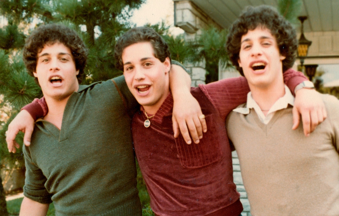 This undated photo provided by film studio NEON shows Eddy Galland, from left, David Kellman and Bobby Shafran, three brothers who learned at age 19 that they had been separated at birth. The story of the three identical triplets is the subject of the film "Three Identical Strangers," which opens in theaters on Friday, June 29, 2018. The film shows not only their joyous first meeting, but also the dark backstory that led to their separation. (Family Photo/Courtesy of film studio NEON via AP)