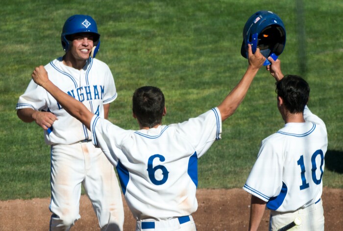 (Rick Egan  |  The Salt Lake Tribune)  The Bingham Miners Tyler Kemp (6) and Nick Stevens (10) celebrate a 3-run homer by Noah Wallick (4), in 6A state baseball State Championship game, at UVU in Orem, Friday, May 25, 2018.