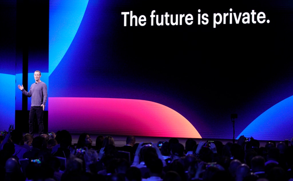 Facebook CEO Mark Zuckerberg, left, makes the keynote speech at F8, the Facebook's developer conference, Tuesday, April 30, 2019, in San Jose, Calif. (AP Photo/Tony Avelar )