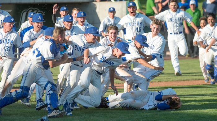 (Rick Egan  |  The Salt Lake Tribune)  The Bingham Miners storm the field to celebrate their win over Riverton, in 6A state baseball State  Championship game, at UVU in Orem, Friday, May 25, 2018.