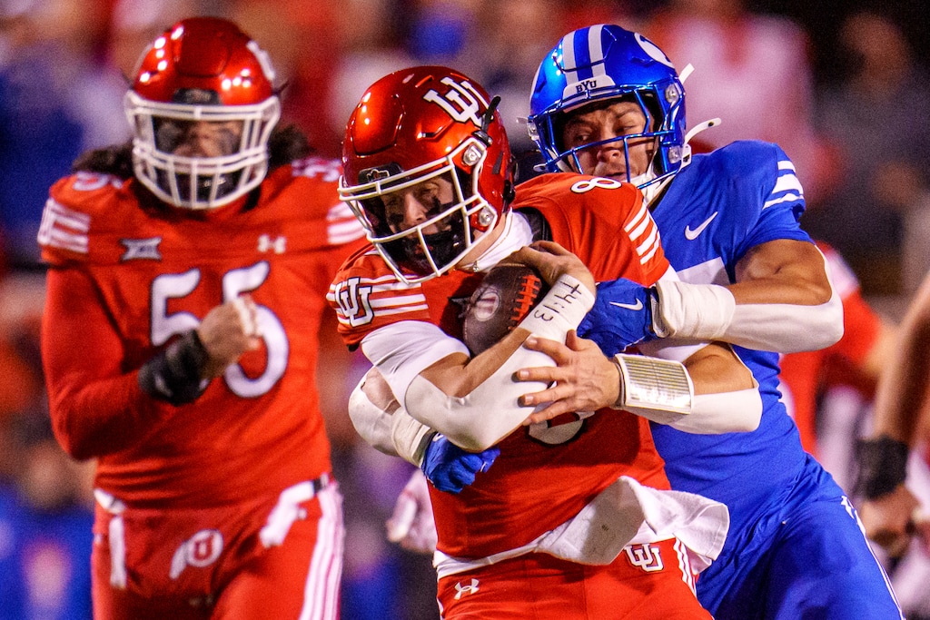 (Trent Nelson  |  The Salt Lake Tribune) Utah Utes quarterback Brandon Rose (8) runs the ball as Utah hosts BYU, NCAA football in Salt Lake City on Saturday, Nov. 9, 2024.