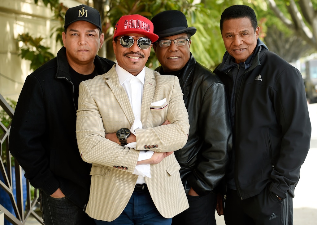 (Chris Pizzello | Invision/AP) In this Tuesday, Feb. 26, 2019 photo, Marlon Jackson, second from left, Tito Jackson, second from right, and Jackie Jackson, far right, brothers of the late musical artist Michael Jackson, and Tito's son Taj, far left, pose together for a portrait outside the Four Seasons Hotel, in Los Angeles. Michael Jackson’s brothers and nephew say they weren’t surprised by a documentary resurrecting allegations of his sexual abuse of children, and they’re prepared to defend him.
