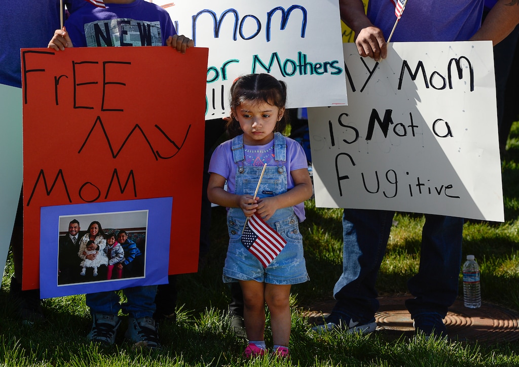 (Francisco Kjolseth | Tribune file photo)  Ariana Juarez, 2, joins a protest on May 3, 2017 after her mother was detained by ICE agents and taken to an undisclosed location.