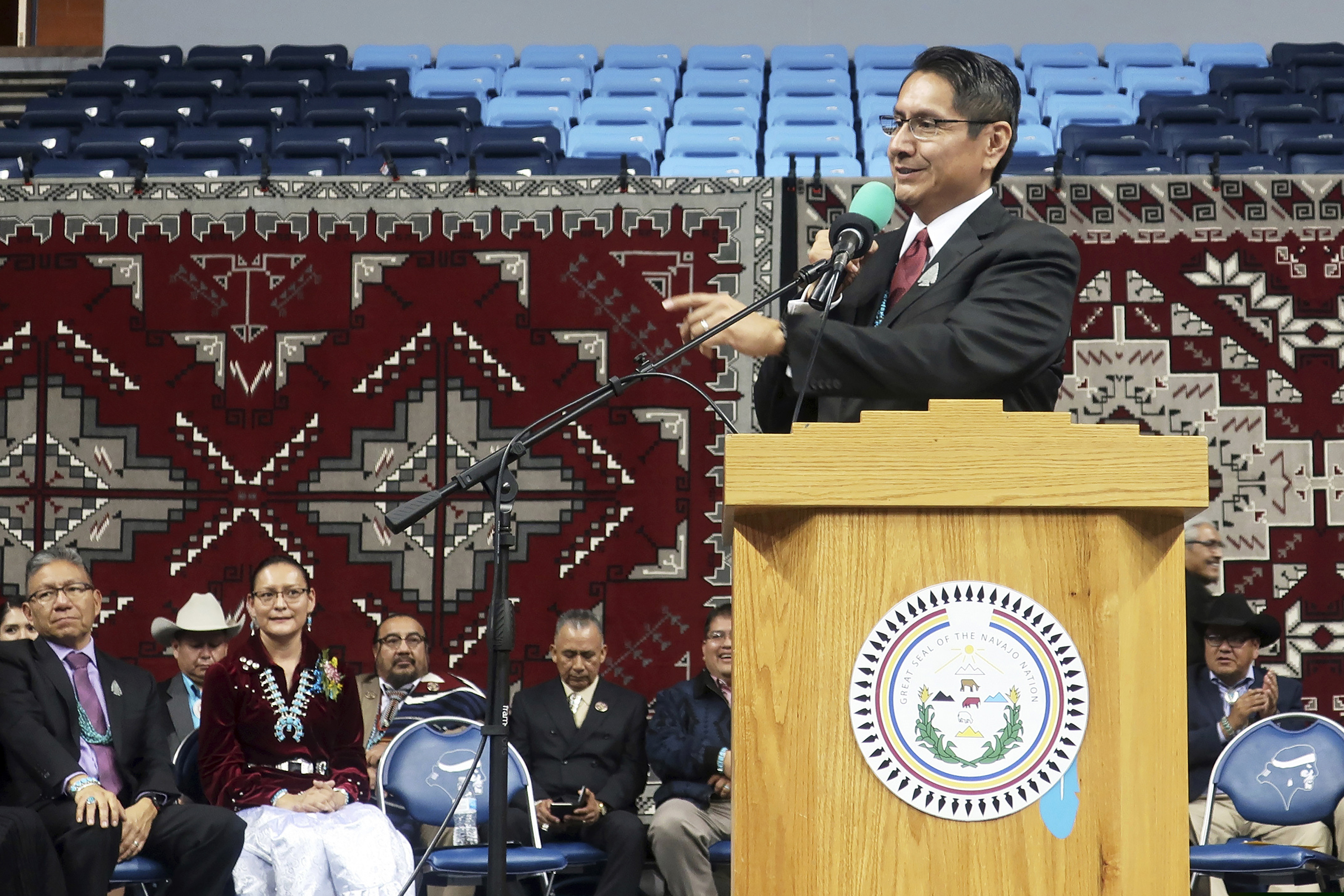 (Felicia Fonseca | AP file photo) In this Jan. 15, 2019 file photo, Jonathan Nez addresses a crowd after he was sworn in as president of the Navajo Nation in Fort Defiance, Ariz. Nez, the leader of one of the largest Native American tribes in the U.S. called Wednesday, June 23, 2020, on New Mexico Gov. Michelle Lujan Grisham to end efforts to fight a court ruling that orders improvements in education for members of his tribe and other vulnerable groups. The comments from Nez come ahead of a court hearing next week in which Gov. Grisham will ask a state judge to dismiss a consolidated lawsuit representing Native American and Hispanic plaintiffs.