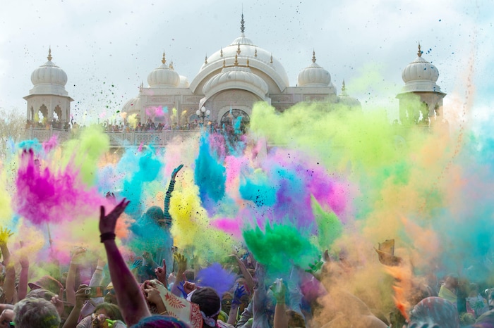 (Rick Egan  |  The Salt Lake Tribune)   Revelers toss colored powder into the air as they celebrate the arrival of spring, during the Holi Festival of Colors celebration at the Sri Sri Radha Krishna Temple in Spanish Fork, Saturday, March 30, 2019.


