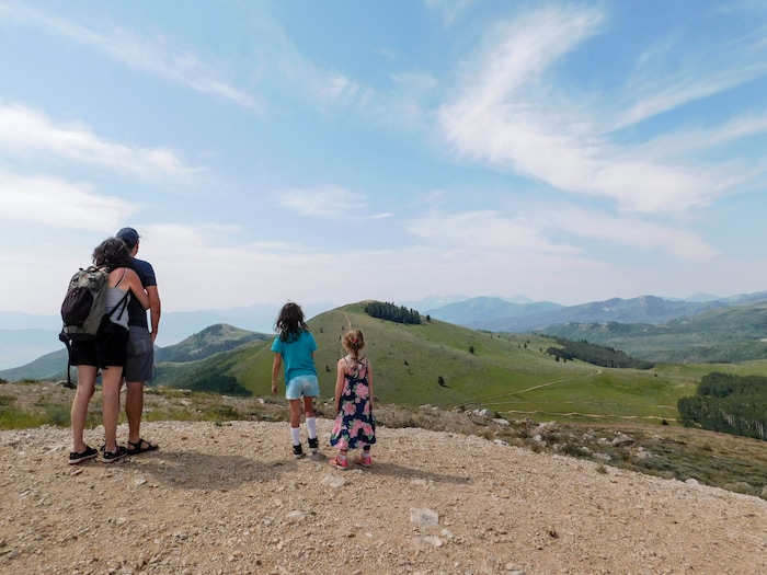 (Erin Alberty|The Salt Lake Tribune) Hikers look at the Wasatch Range from Bald Mountain, at the top of the Sterling Express Lift on Aug. 6, 2017 at Deer Valley Resort.