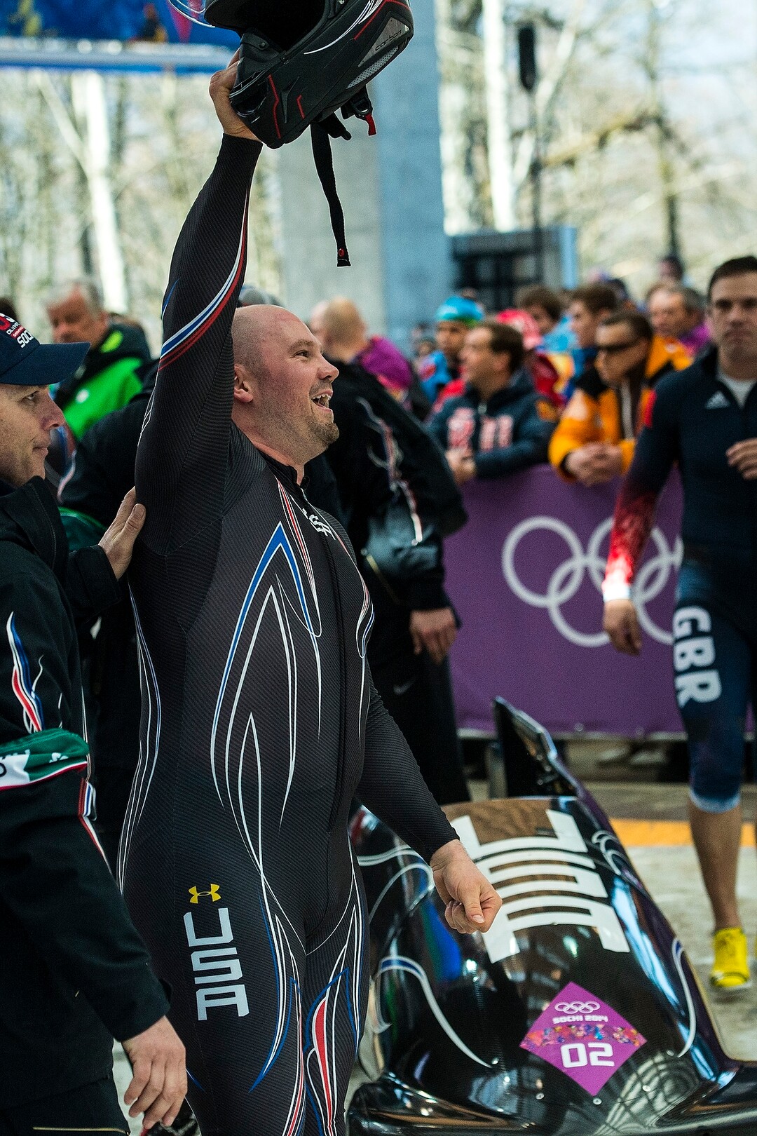KRASNAYA POLYANA, RUSSIA  - JANUARY 23:USA's pilot Steven Holcomb celebrates after the four-man bobsled at Sanki Sliding Center during the 2014 Sochi Olympics Sunday February 23, 2014. They won the bronze medal with a cumulative time of 3:40.99. (Photo by Chris Detrick/The Salt Lake Tribune)