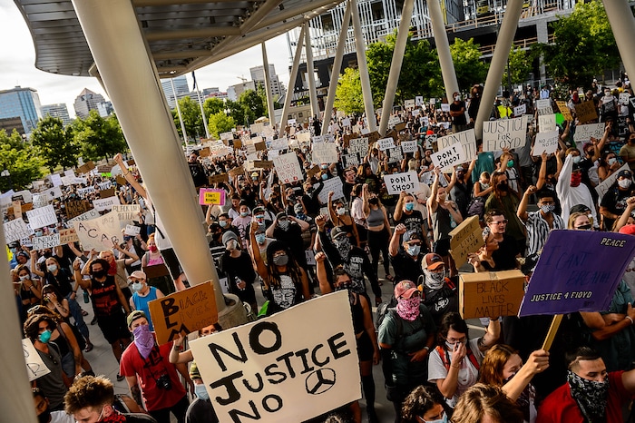 (Trent Nelson  |  The Salt Lake Tribune) Protesters in front of the Public Safety Building during a protest against police brutality in Salt Lake City on Monday, June 1, 2020.