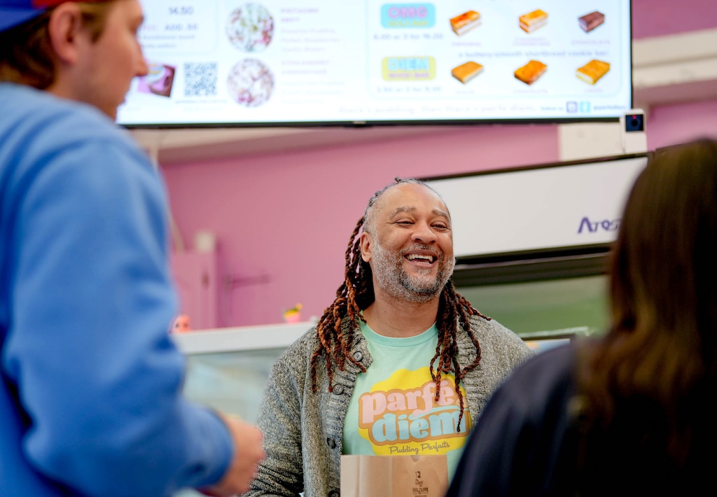 (Francisco Kjolseth  | The Salt Lake Tribune) Parker D. Barbee, owner of Parfé Diem in Sugar House, attends to customers on Thursday, Feb. 12, 2025.