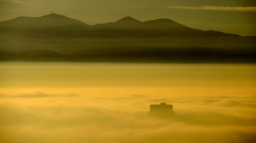 (Steve Griffin  |  The Salt Lake Tribune) The LDS Church Office Building rises from dense fog as an inversion settles over the Salt Lake Valley on Tuesday December 26, 2017.
