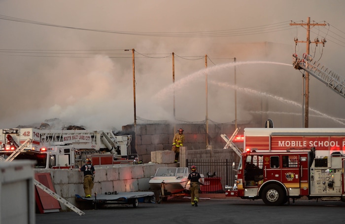 (Francisco Kjolseth  |  The Salt Lake Tribune) Fire crews respond to a fire at Rocky Mountain Recycling South Salt Lake on Saturday, July 11, 2020.