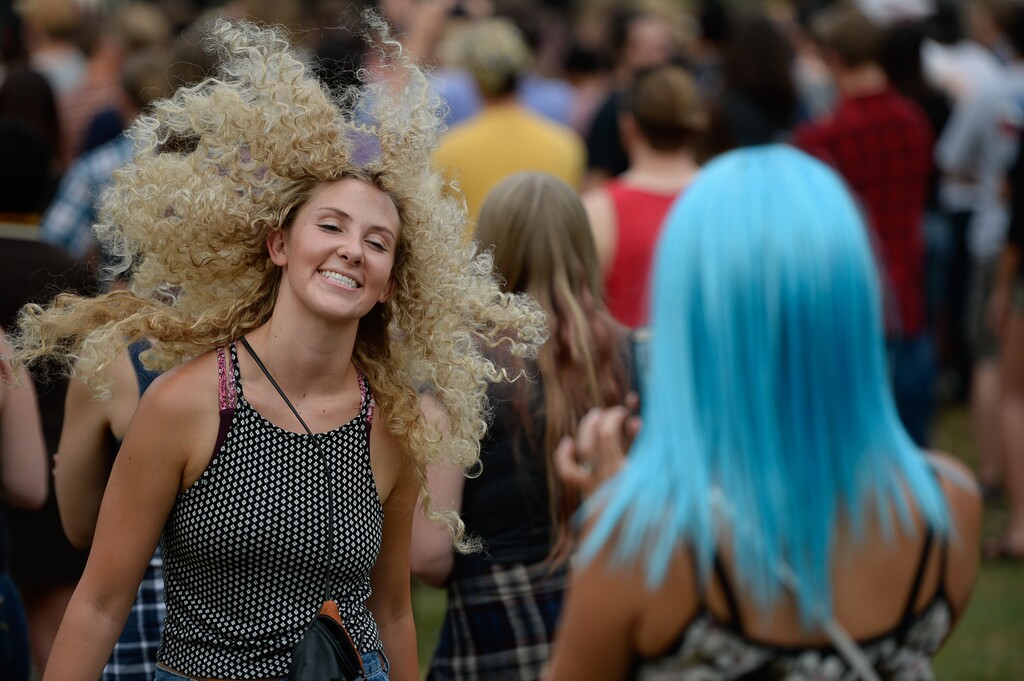 Francisco Kjolseth | The Salt Lake Tribune
People pass the time as they wait for Indie garage-rock duo The Kills, formed by American singer Alison Mosshart and British guitarist Jamie Hince, to take the stage Aug. 6 in Pioneer Park in downtown Salt Lake City as part of the Twilight Concert Series.
