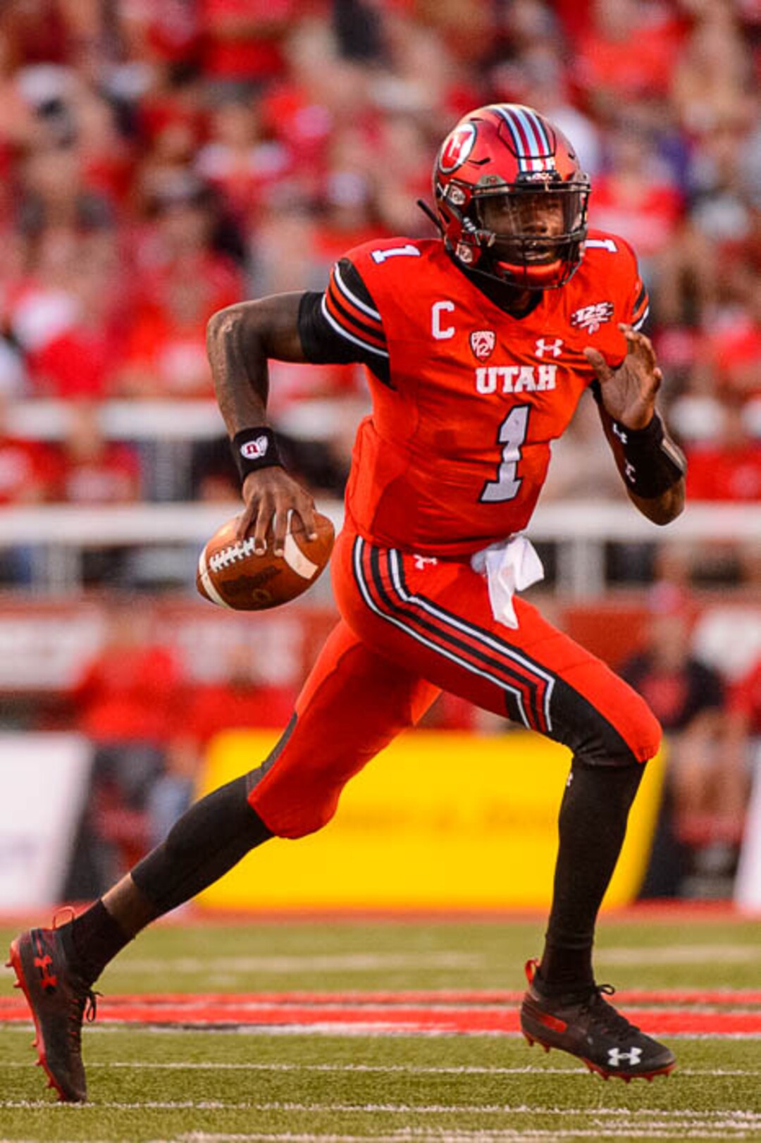 (Trent Nelson | The Salt Lake Tribune)  Utah Utes quarterback Tyler Huntley (1) as the University of Utah Utes host the Weber State Wildcats, Thursday Aug. 30, 2018 at Rice-Eccles Stadium in Salt Lake City.