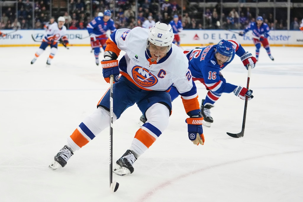 (Frank Franklin II | AP) Former New York Islanders captain Anders Lee (27) and former New York Rangers center Vincent Trocheck (16) are teaming up in Utah.