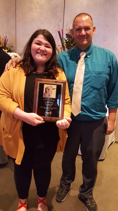 (Photo courtesy of Bob & Dolores Hope Foundation)  Naomi Winders, essay contest winner, with her high school band director, Jamin Burton. Winders, an Alaska native now a freshman at BYU in Provo, won a $10,000 scholarship for herself and another $10,000 for her high school from The Bob & Dolores Hope Foundation. She will play bass drum with her high school band from Palmer, Alaska, in the Macy’s Thanksgiving Day Parade in New York City.