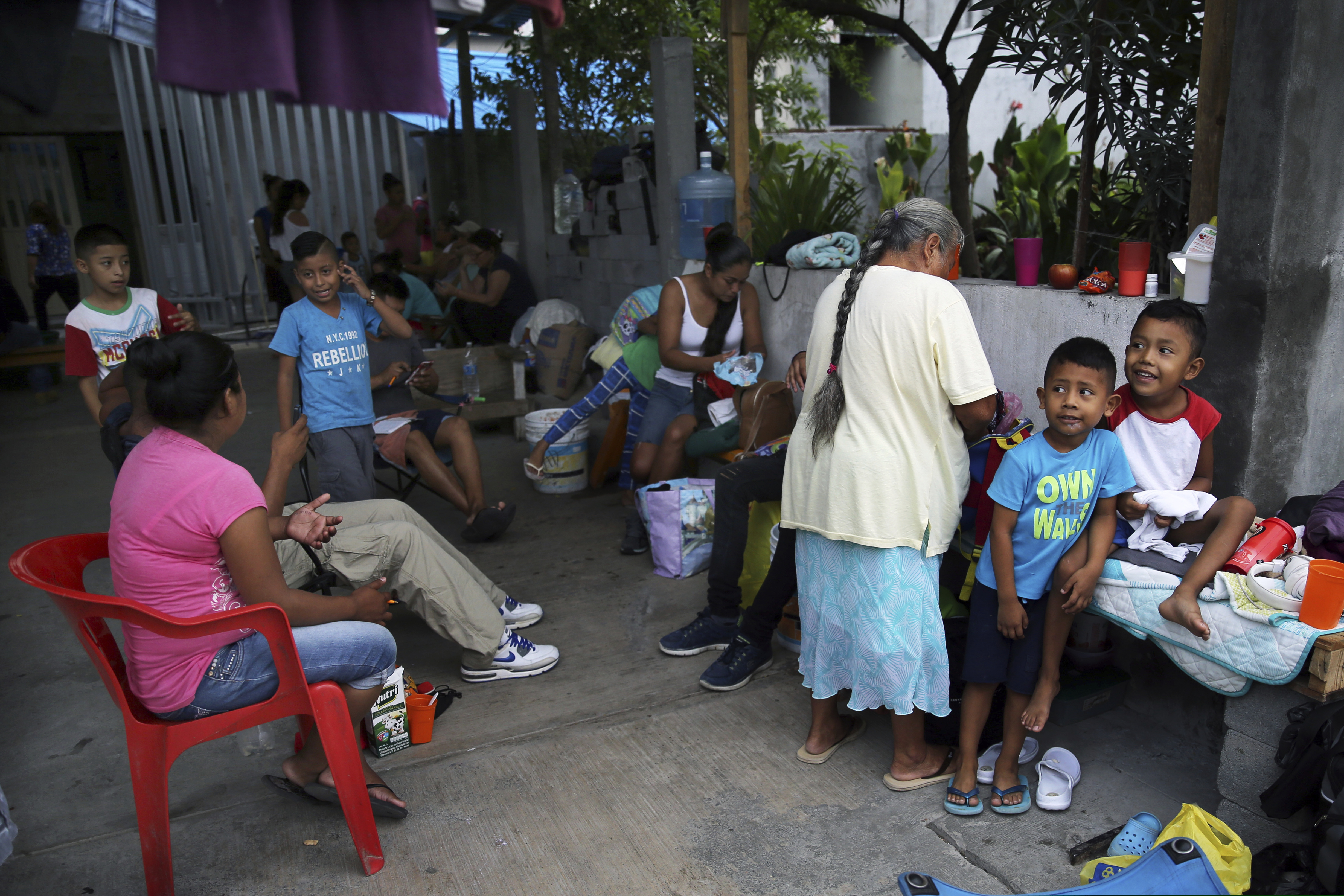 (Marco Ugarte | AP file photo) Migrants wait to be taken to the U.S. border to apply for asylum, at the AMAR migrant shelter in Nuevo Laredo, Mexico, Wednesday, July 17, 2019. Asylum-seekers grappled to understand what a new U.S. policy that all but eliminates refugee claims by Central Americans and many others meant for their bids to find a better life in America amid a chaos of rumors, confusion and fear.