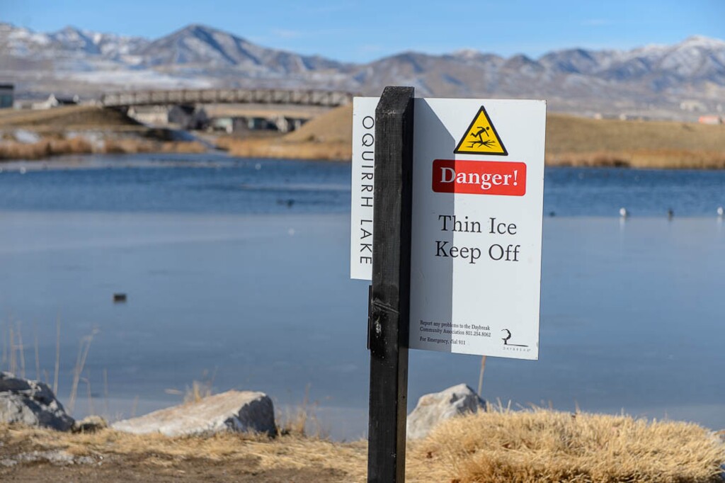 (Trent Nelson | The Salt Lake Tribune)    An ice fisherman fell through the ice in a retention pond near Oquirrh Lake — shown here — in South Jordan, Friday December 29, 2017. The man was out of the lake by the time rescue crews arrived.