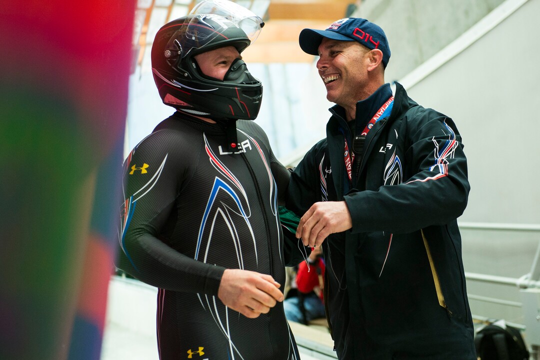 KRASNAYA POLYANA, RUSSIA  - JANUARY 23:USA's pilot Steven Holcomb celebrates with USA bobsled Head Coach Brian Shimer after the four-man bobsled at Sanki Sliding Center during the 2014 Sochi Olympics Sunday February 23, 2014. They won the bronze medal with a cumulative time of 3:40.99. (Photo by Chris Detrick/The Salt Lake Tribune)