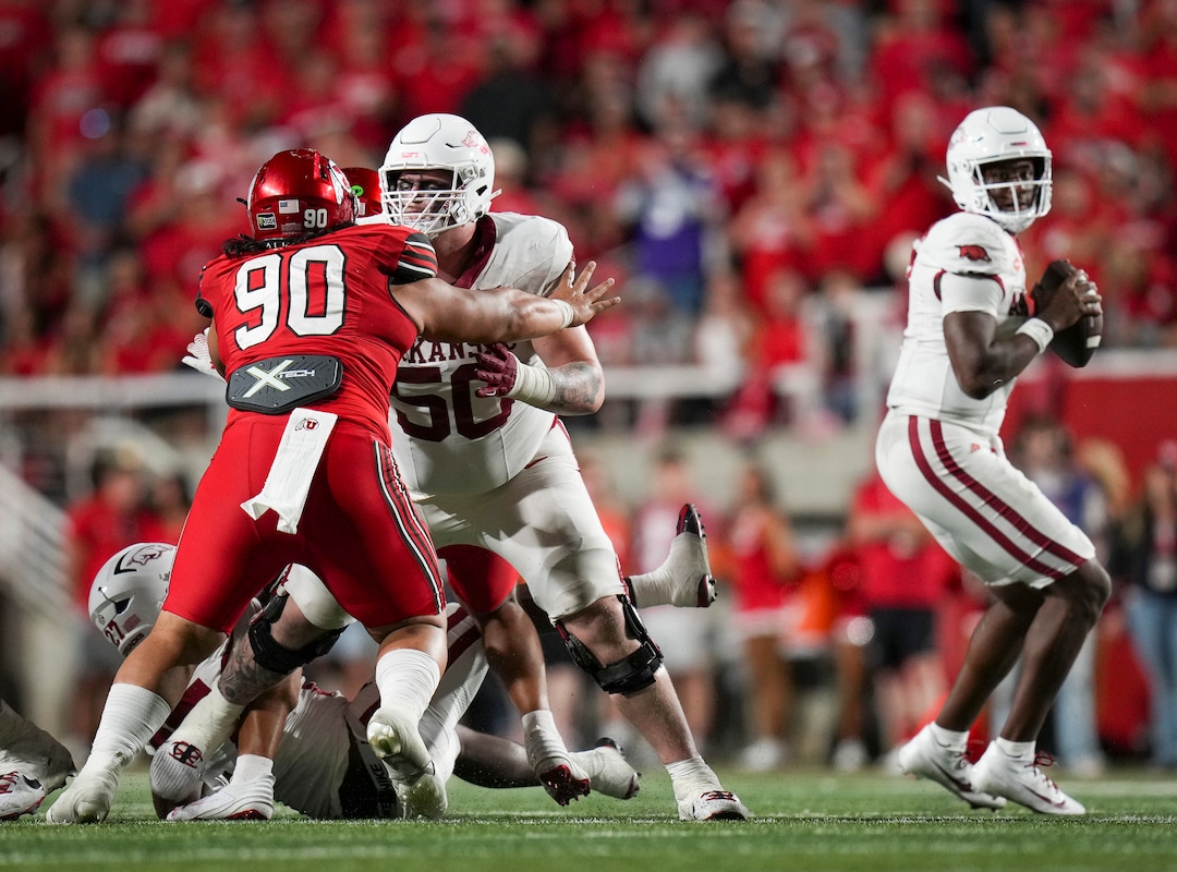 (Bethany Baker  |  The Salt Lake Tribune) Utah Utes defensive tackle Jireh Moe (90) blocks Arkansas Razorbacks offensive lineman Kobe Branham (50) during the game between the Utah Utes and the Arkansas Razorbacks in Salt Lake City on Saturday, Sept. 12, 2026.
