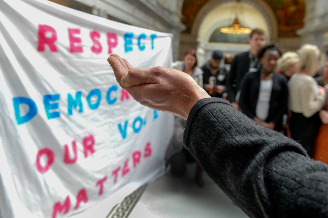 Leah Hogsten  |  The Salt Lake Tribune  Pastor David Nichols with Mt. Tabor Lutheran Church demonstrates in opposition to SB96 outside the Utah House chambers, Feb. 8, 2019. 