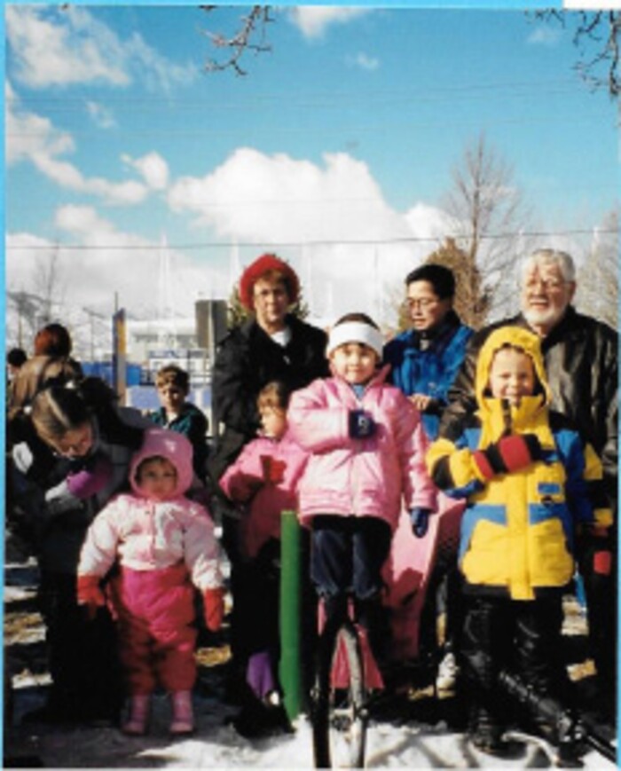 (Courtesy Photo)  Jerica Tandiman watching the Olympic torch relay in Kearns.