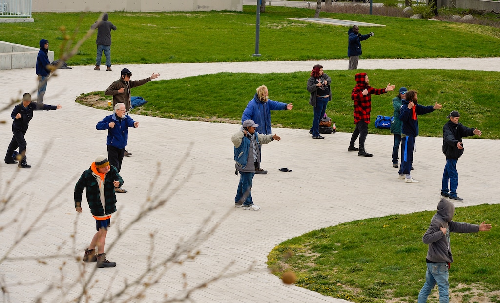 (Chris Samuels | The Salt Lake Tribune) Members of the unsheltered community participate in tai chi at the City Library in Salt Lake City, Thursday, April 14, 2022.