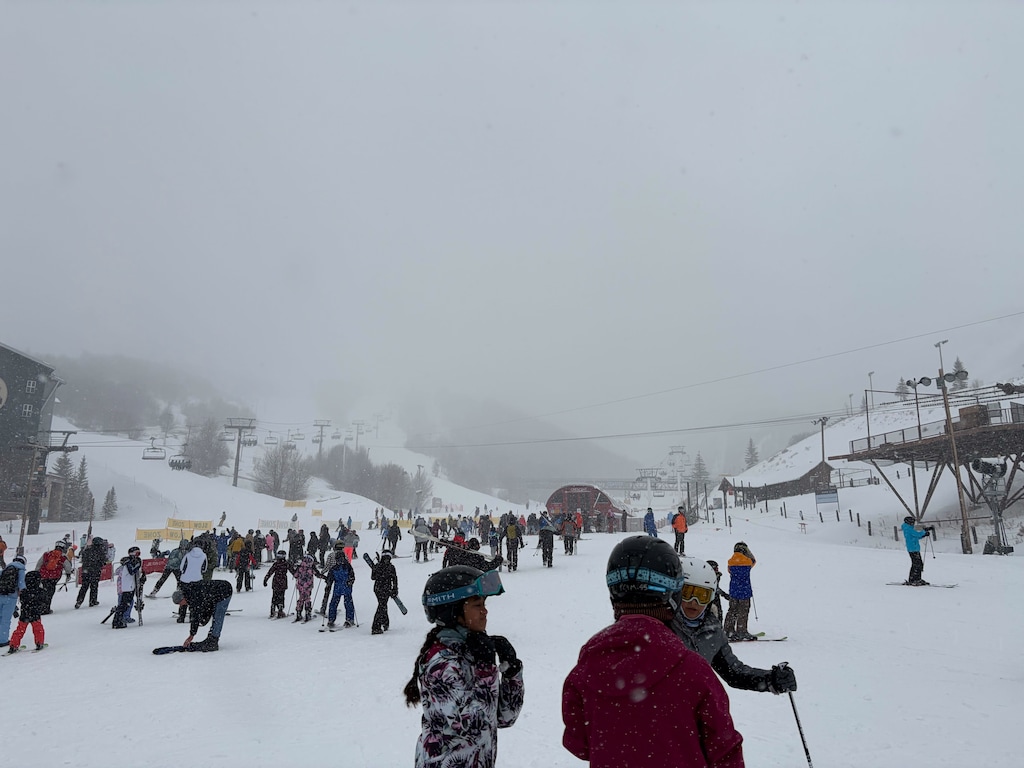(Megan Banta | The Salt Lake Tribune) People line up for the Payday and Crescent lifts at Park City Mountain Resort as a winter storm dumps snow and lowers visibility in Park City on Wednesday, Feb. 18, 2026.