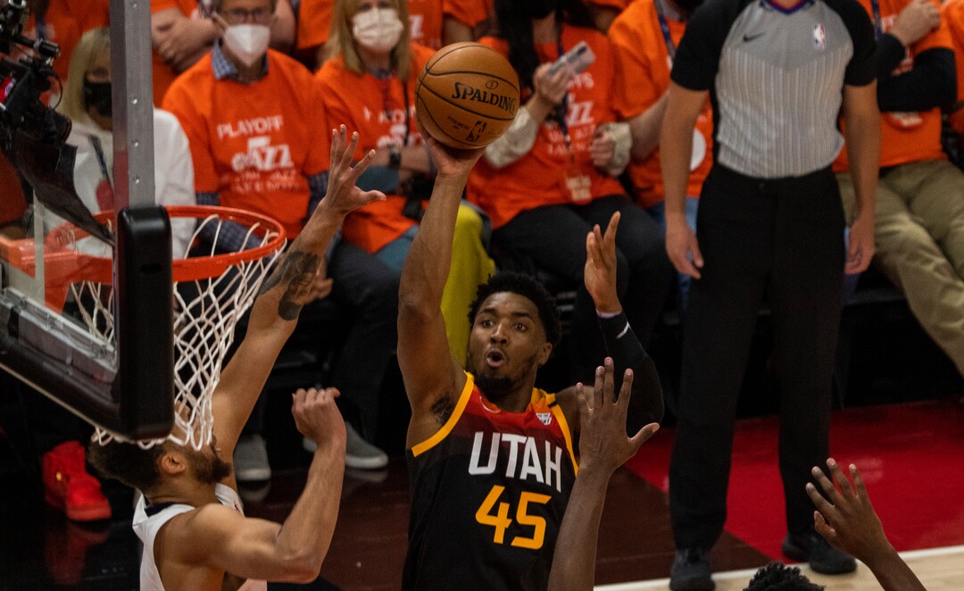 (Rick Egan | The Salt Lake Tribune) Utah Jazz guard Donovan Mitchell (45) shoots, as  Memphis Grizzlies forward Kyle Anderson (1) and Memphis Grizzlies forward Jaren Jackson Jr. (13) defend, in NBA Playoff game 2, between the Utah Jazz and the Memphis Grizzlies at Vivint Arena, on Wednesday, May 26, 2021.
