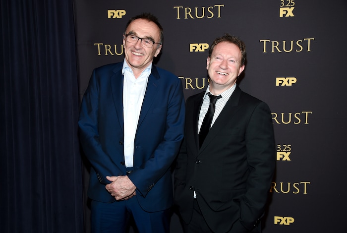 Director and executive producer Danny Boyle, left, poses with creator, writer and executive producer Simon Beaufoy at a special screening of FX Networks' "Trust" at Florence Gould Hall on Wednesday, March 14, 2018, in New York. (Photo by Evan Agostini/Invision/AP)
