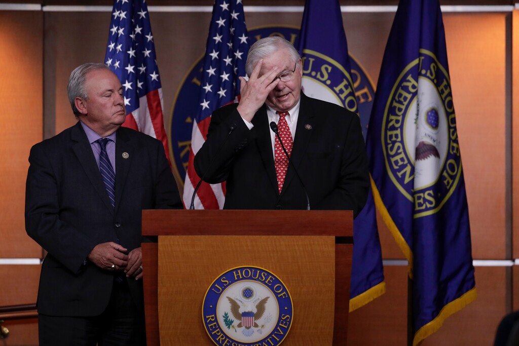 (J. Scott Applewhite | The Associated Press) Republican Rep. Joe Barton, R-Texas, right, accompanied by Democrat Rep. Mike Doyle, D-Pa., speaks during a news conference on Capitol Hill in Washington, D.C., on June 14, 2017. Barton, who apologized Wednesday for a lewd photo of him that circulated on the Internet, told a woman to whom he had sent sexually explicit photos, videos and messages that he would report her to the Capitol Police if she exposed his behavior, according to a recording reviewed by The Washington Post.