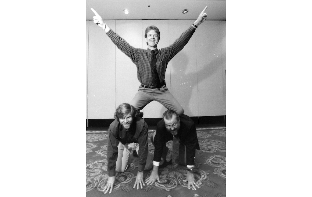 (Photo by Rick Egan | The Salt Lake Tribune) Steve Benson, above, goofs around with fellow cartoonists Pat Bagley and Calvin Grondahl in 1995.