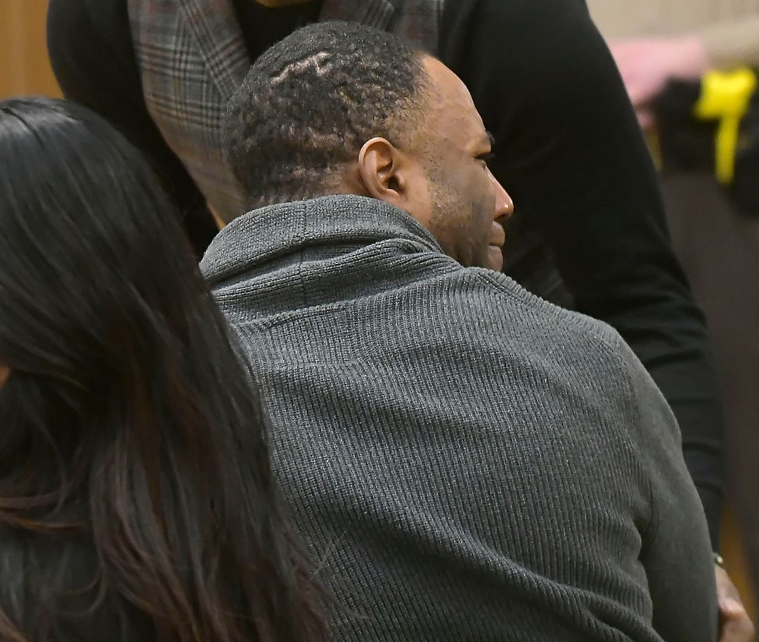 Torrey Green looks back at his family, after a jury finds him guilty of eight charges including five counts of rape and a charge sexual battery in connection to reports from six women accusing him of sexual assault while he was a football player at Utah State University, Friday, Jan.18, 2019 in Brigham City, Utah. (Eli Lucero/Herald Journal via AP)