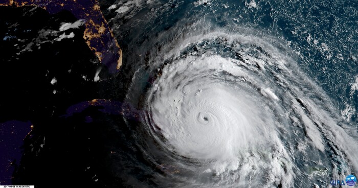 (NOAA via AP) In this geocolor image GOES-16 satellite image taken Friday, Sept. 8, 2017, at 11:45 UTC, sunlight, from the right, illuminates Hurricane Irma as the storm approaches Cuba and Florida. Cuba evacuated tourists from beachside resorts and Floridians emptied stores of plywood and bottled water after Hurricane Irma left at least 20 people dead and thousands homeless on a devastated string of Caribbean islands and spun toward Florida for what could be a catastrophic blow this weekend.