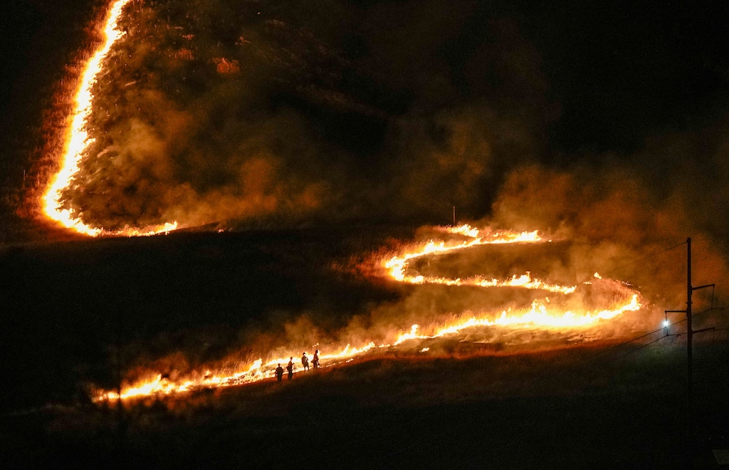 (Francisco Kjolseth | The Salt Lake Tribune) Crews battle a fire in the foothills above the University of Utah as it moves towards Federal Heights on Saturday, June 20, 2026.