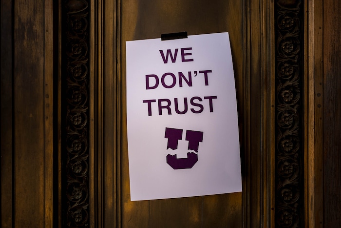 (Trent Nelson | The Salt Lake Tribune) Protesters put up posters at the University of Utah in Salt Lake City on Thursday, Sept. 3, 2020. The protest called for President Ruth Watkins to resign and for the campus police department to be dissolved..