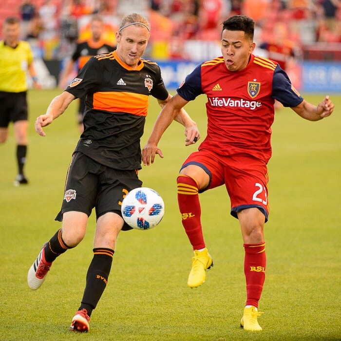 (Trent Nelson | The Salt Lake Tribune)  
Houston's Jared Watts (33) and Real Salt Lake midfielder Sebastian Saucedo (23) as Real Salt Lake hosts Houston Dynamo, MLS Soccer at Rio Tinto Stadium in Sandy, Utah, Wednesday May 30, 2018.