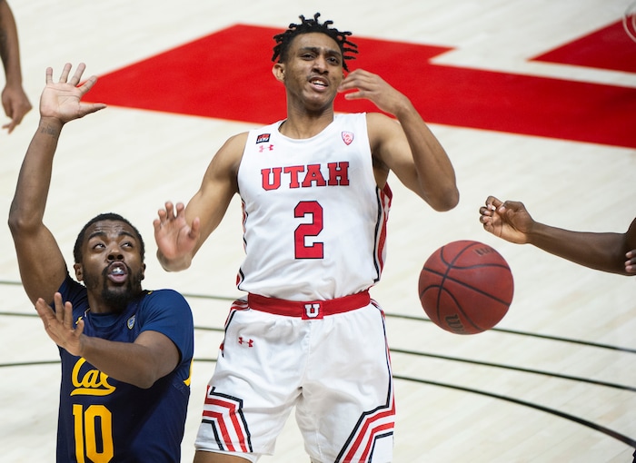 (Rick Egan | The Salt Lake Tribune)  Utah Utes guard Ian Martinez (2) has the ball snatched by California Golden Bears California Golden Bears guard Jalen Celestine (32) and California Golden Bears guard Makale Foreman (10), in PAC12 Basketball action between the Utah Utes and the California Golden Bears, on Wednesday, Jan. 16, 2021.