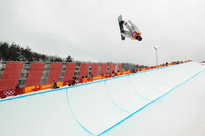 (Chris Detrick  |  The Salt Lake Tribune)  Shaun White competes during the men's halfpipe finals at Phoenix Snow Park during the Pyeongchang 2018 Winter Olympics Wednesday, Feb. 14, 2018.  White won the event with a 97.75, his third Olympic gold medal in the halfpipe (2006, 2010, 2018).