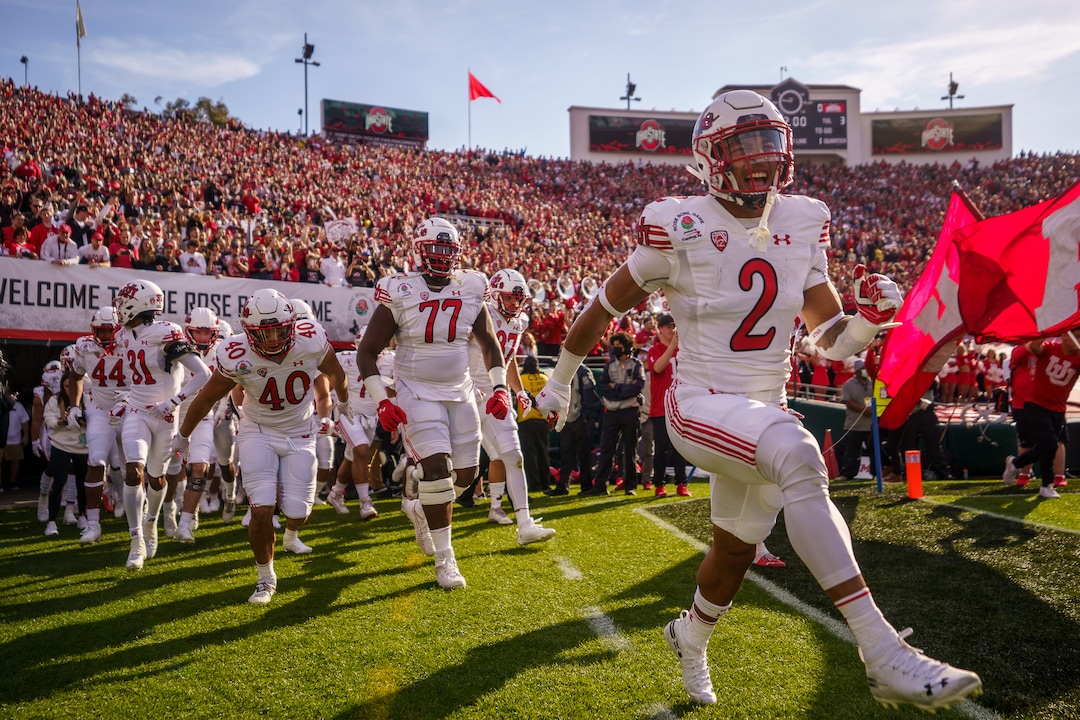(Trent Nelson  |  The Salt Lake Tribune) Utah takes the field as the Utah Utes face the Ohio State Buckeyes at the Rose Bowl in Pasadena, Calif., on Saturday, Jan. 1, 2022.