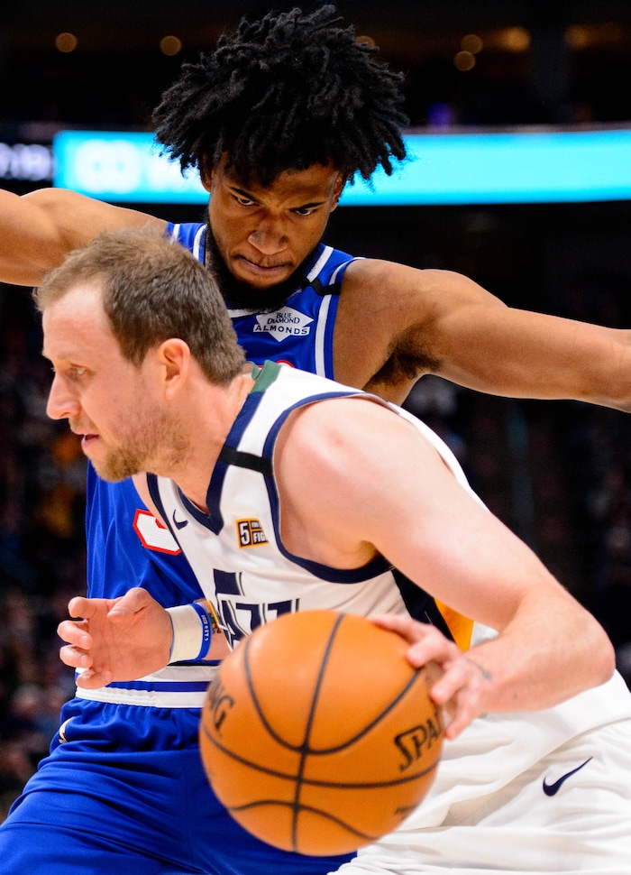 (Trent Nelson  |  The Salt Lake Tribune) Utah Jazz forward Joe Ingles (2) defended by Sacramento Kings forward Marvin Bagley III (35) as the Utah Jazz host the Sacramento Kings, NBA basketball in Salt Lake City on Saturday, Jan. 18, 2020.