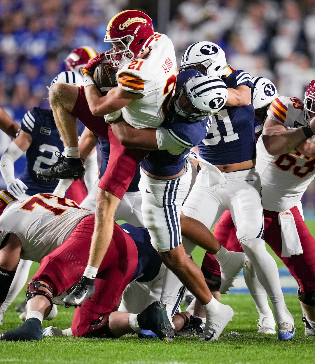 (Bethany Baker  |  The Salt Lake Tribune) BYU Cougars defensive lineman Tausili Akana (13) has a personal foul against Iowa State Cyclones running back Aiden Flora (21) during the game between the BYU Cougars and the Iowa State Cyclones in Provo on Friday, Oct. 9, 2026.