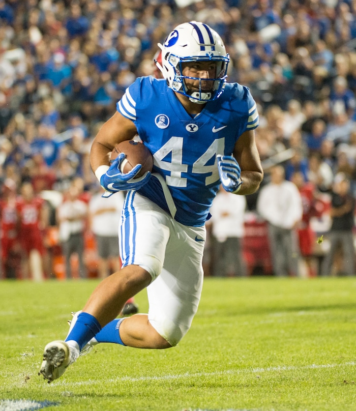 (Rick Egan  |  The Salt Lake Tribune)   Brigham Young Cougars running back Kavika Fonua (44) runs with the ball, in football action BYU vs Utah, at Lavell Edwards Stadium in Provo, Saturday, September 9, 2017.