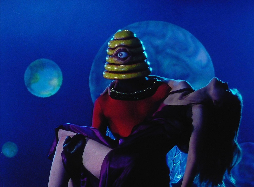 (Photo courtesy of Trent Harris) A beehive-headed alien carries Lucinda (Stefene Russell), the heroine of Trent Harris' 1995 B-movie homage to Utah history, "Plan 10 From Outer Space."