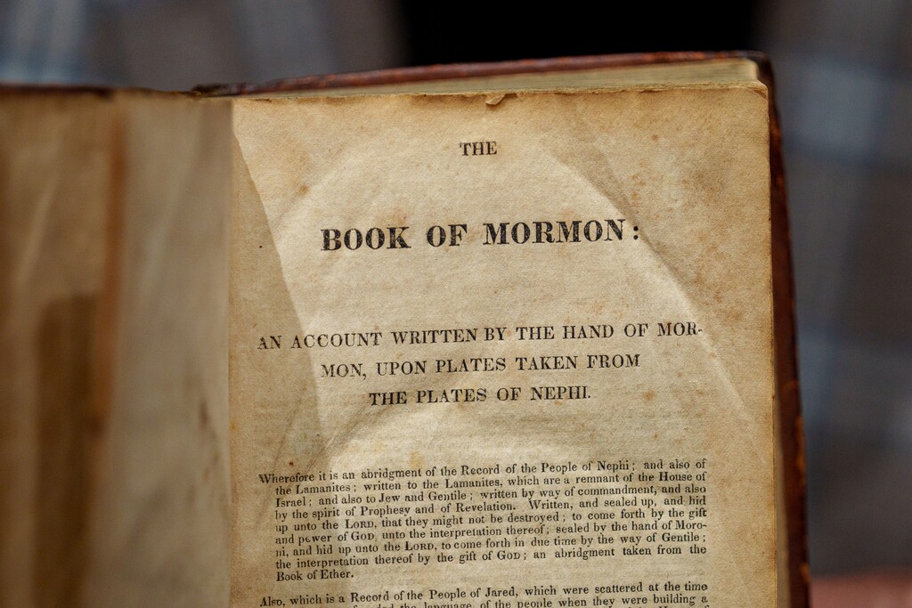 (Trent Nelson  |  The Salt Lake Tribune) A first edition the Book of Mormon. The story of the "Three Nephites" appears in the volume.